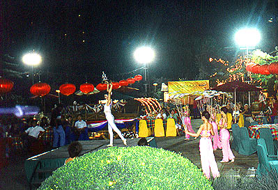 Acrobats
                  and winsome lasses with plates on sticks