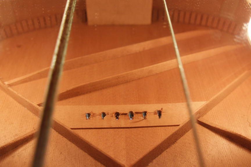 replace bridge plate on guitar