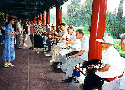 A group of fiddlers, the woman singing had the most lovely gestures as she sang.