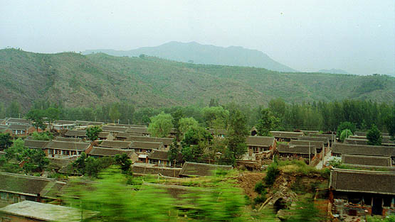 a rural village seen from a speeding car!